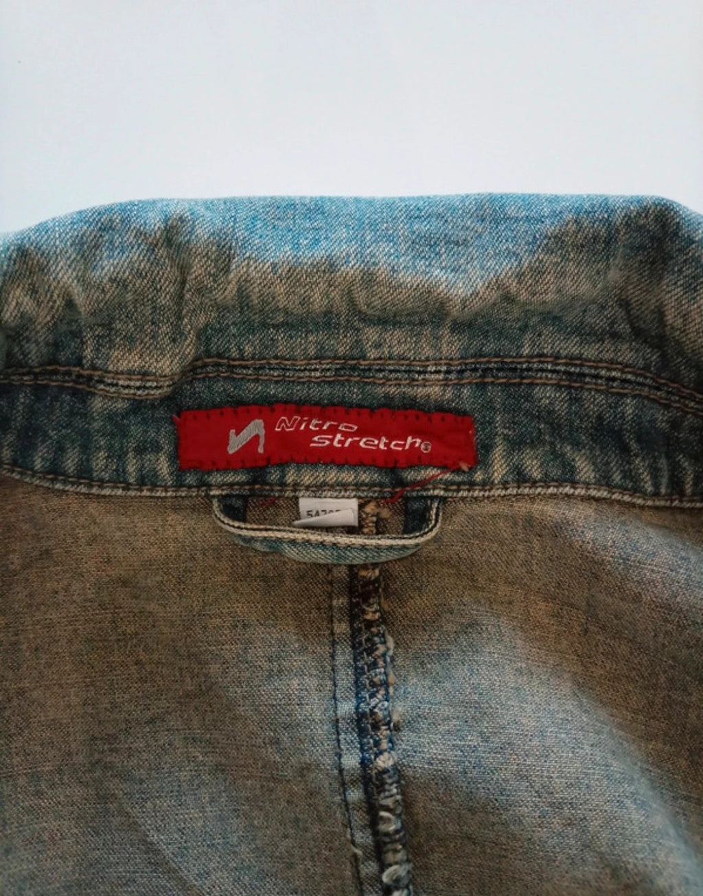 Nitro Stretch blue denim blazer jacket with western-style collar and fitted silhouette.