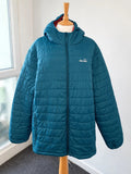 Peter Storm teal blue puffer jacket with hood and contrasting orange lining.