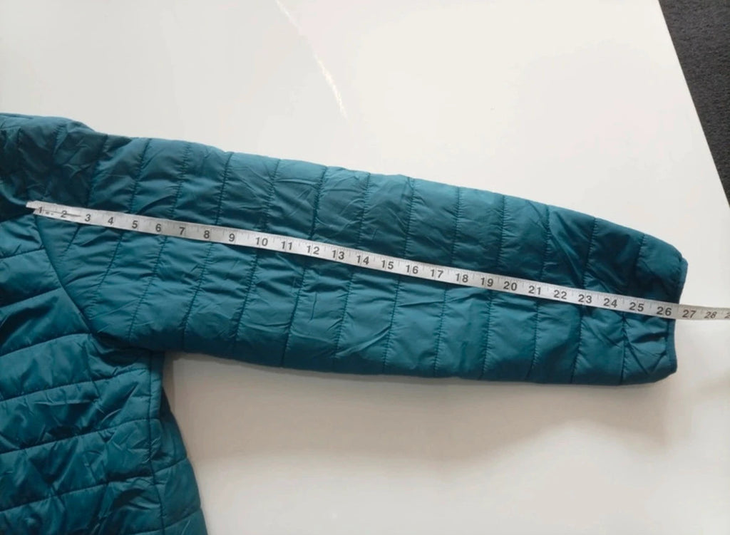Peter Storm teal blue puffer jacket with hood and contrasting orange lining.
