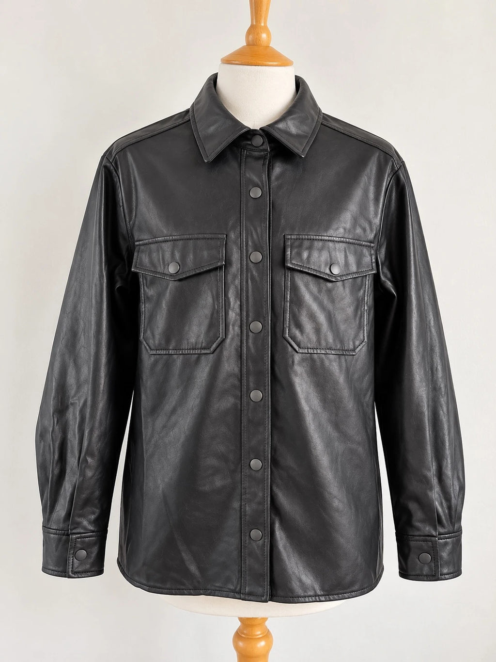 Topshop black faux leather shacket with classic collar and press-stud front fastening.
