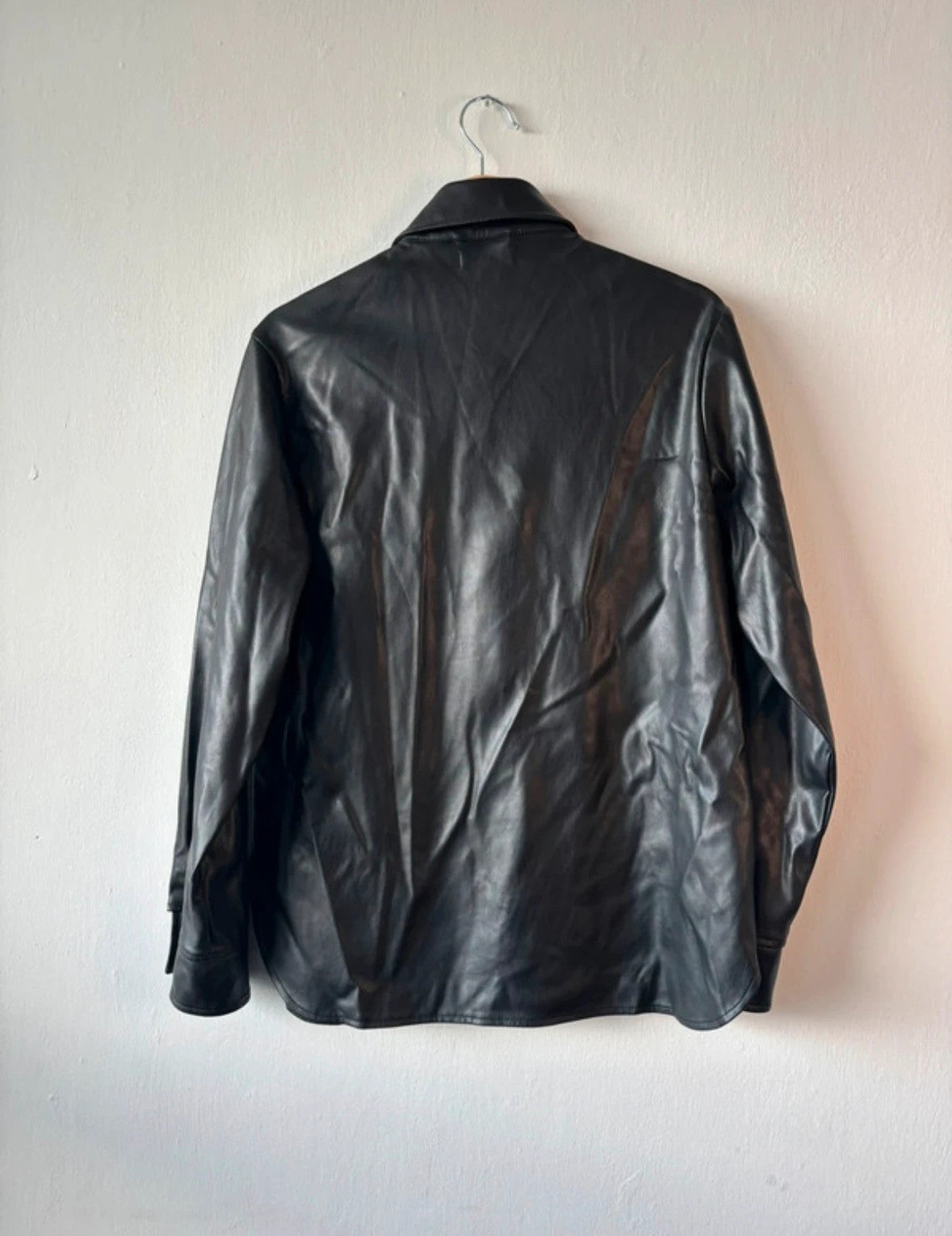 Topshop black faux leather shacket with classic collar and press-stud front fastening.