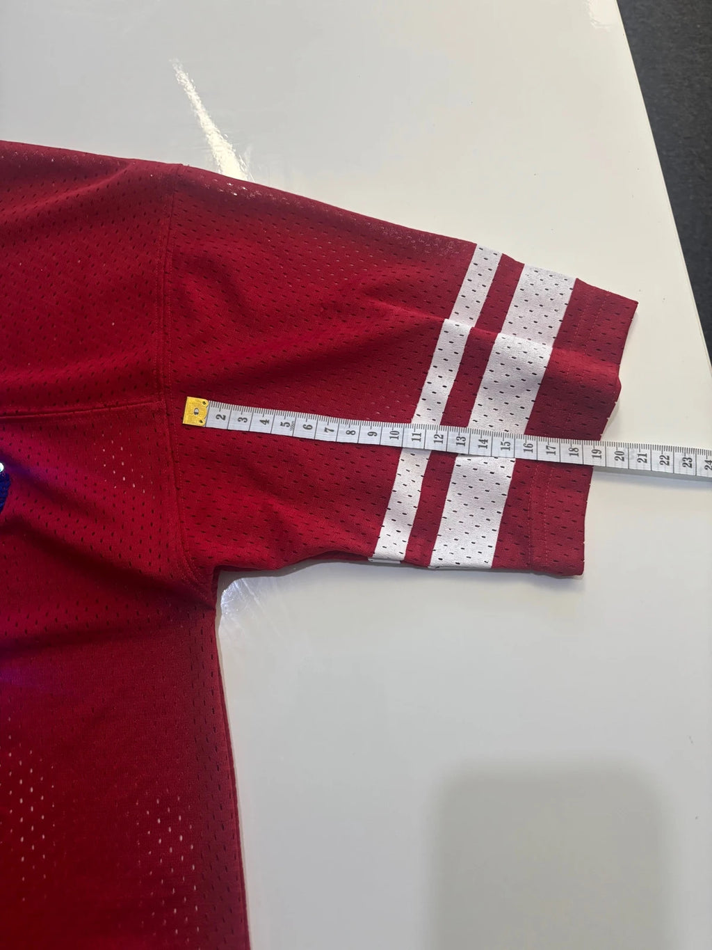 Victoria's Secret PINK burgundy NFL jersey with blue sequined GIANTS lettering and white trim.