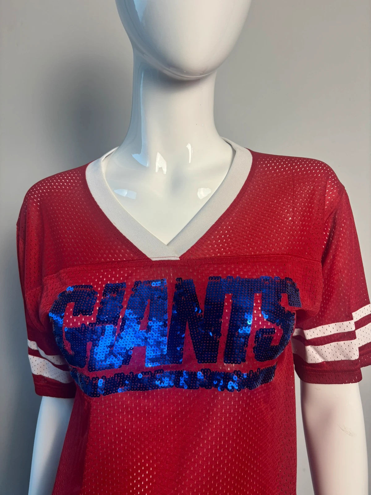Victoria's Secret PINK burgundy NFL jersey with blue sequined GIANTS lettering and white trim.