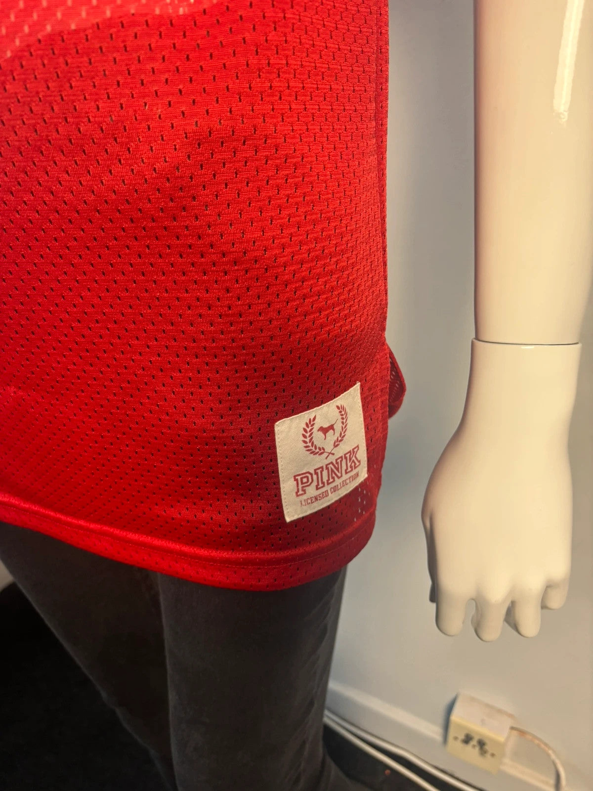 Victoria's Secret PINK burgundy NFL jersey with blue sequined GIANTS lettering and white trim.